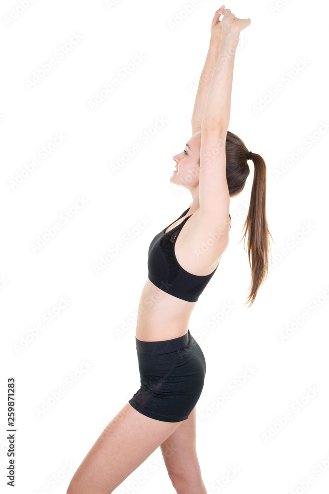 young slim and pretty woman doing stretching young slim and pretty woman doing stretching