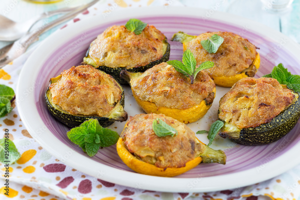 Round zucchini stuffed with tuna and fresh garnished with fresh mint Round zucchini stuffed with tuna and fresh garnished with fresh mint