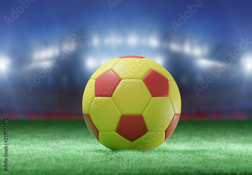 Football ball on the field of a stadium - 3d rendering