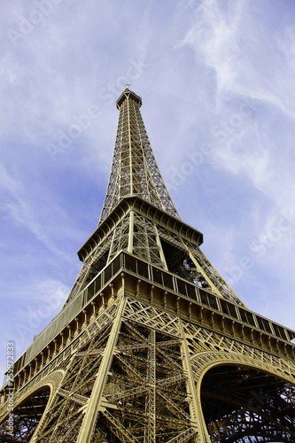 Eiffel Tower in Paris Against Nice Blue Cloudy Sky © Vishal