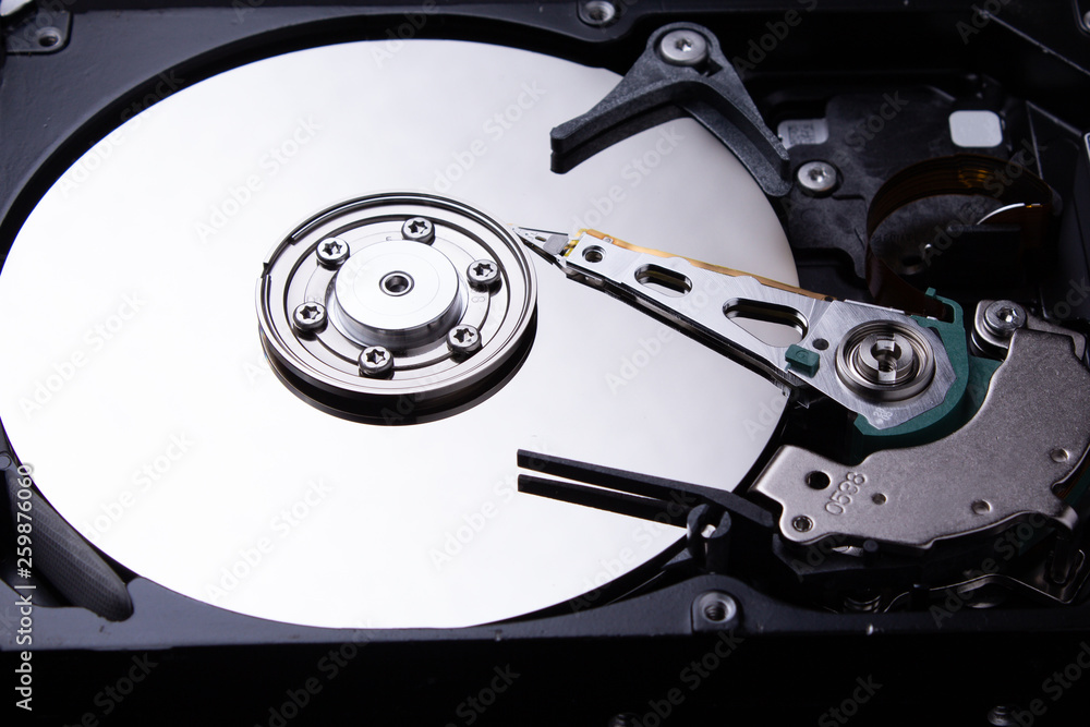 Computer hard disk closeup. Detail of a computer. Computer hard disk closeup. Detail of a computer.