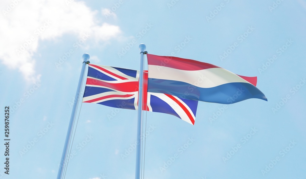 UK and Netherlands, two flags waving against blue sky. 3d image UK and Netherlands, two flags waving against blue sky. 3d image