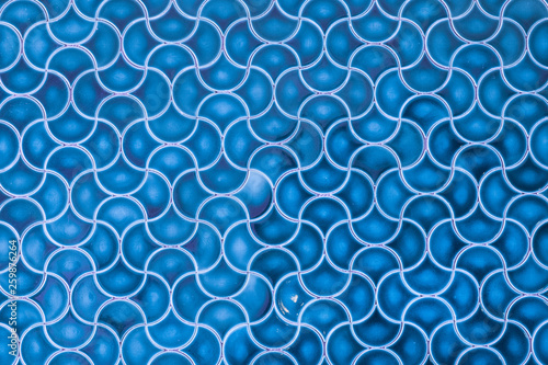 blue mosaic tile with arabic pattern
