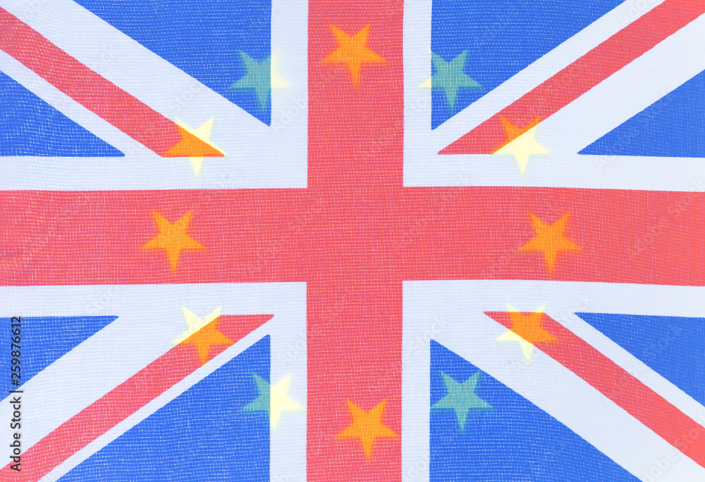 Fototapeta premium Background of EU and UK waving flags, part of European flag visible through transparent Union Jack with copy space. Brexit and cooperation concept, deal or no-deal