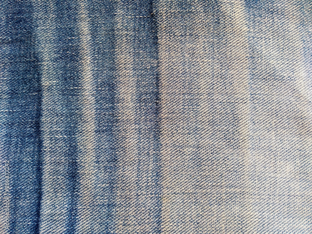 Jeans texture, denim fabric. Denim background texture for design. Blue jeans texture for any background. Jeans texture, denim fabric. Denim background texture for design. Blue jeans texture for any background.
