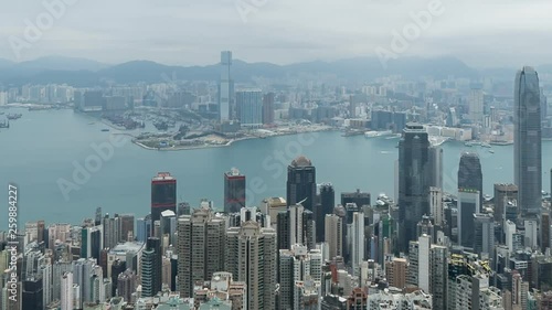 HONG KONG, CHINA - APRIL 2, 2019: 4K Cinematic Double Zoomed Time Lapse Footage of Victoria Harbour taken from The Peak in Hong Kong during cloudy day.