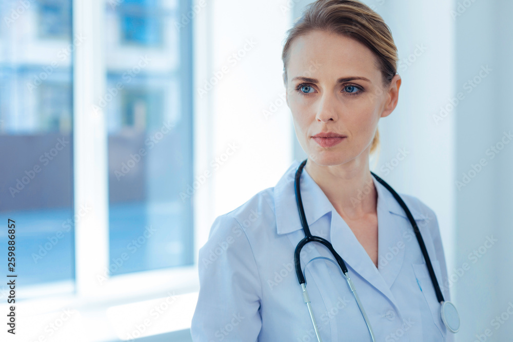 Confident medical worker being ready for examination Confident medical worker being ready for examination
