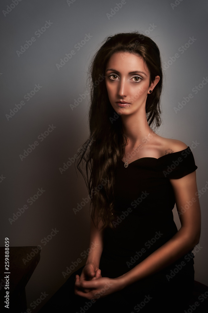 Foto de young girl with long neck in Modigliani style do Stock
