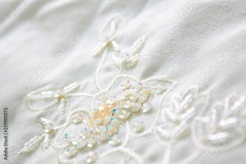 elegant embroidery design on a white pillow