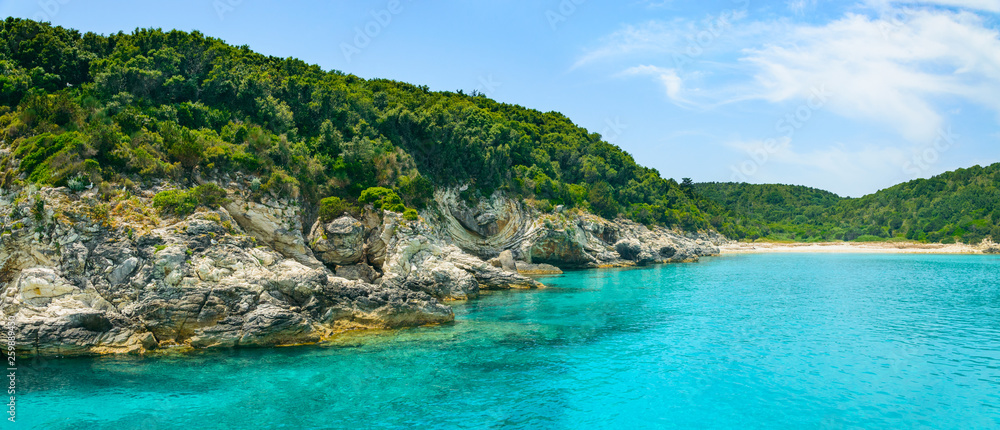 Corfu, Paxos Coast, high cliffs over the blue sea.