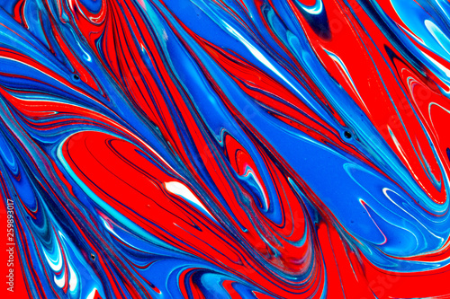 Abstract seamless background of red, white and blue liquid paint swirls