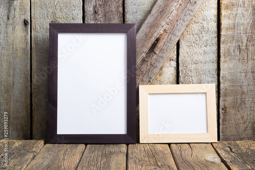 picture frame blank paper at rustic wooden interior
