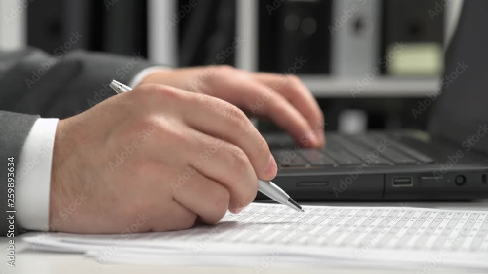Businessman working in an office. Hands closeup. Businessman working in an office. Hands closeup.
