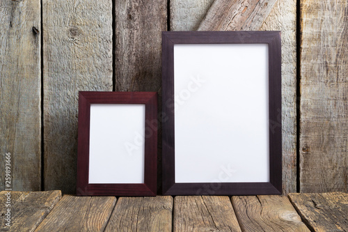 picture frame blank paper at rustic wooden interior