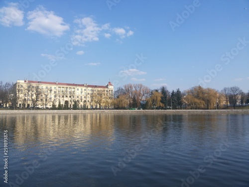 calm lake and Minsk downtown © Mikalai Drazdou