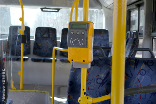Ticket validator, card reader in public bus. Device for reading and scanning of public transport cards to pay for riding in public transport. 