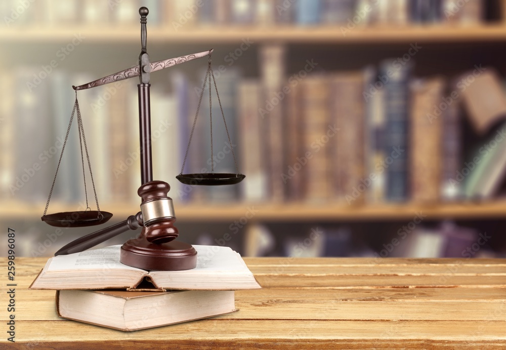 Justice Scales and books and wooden gavel on table. Justice concept Justice Scales and books and wooden gavel on table. Justice concept
