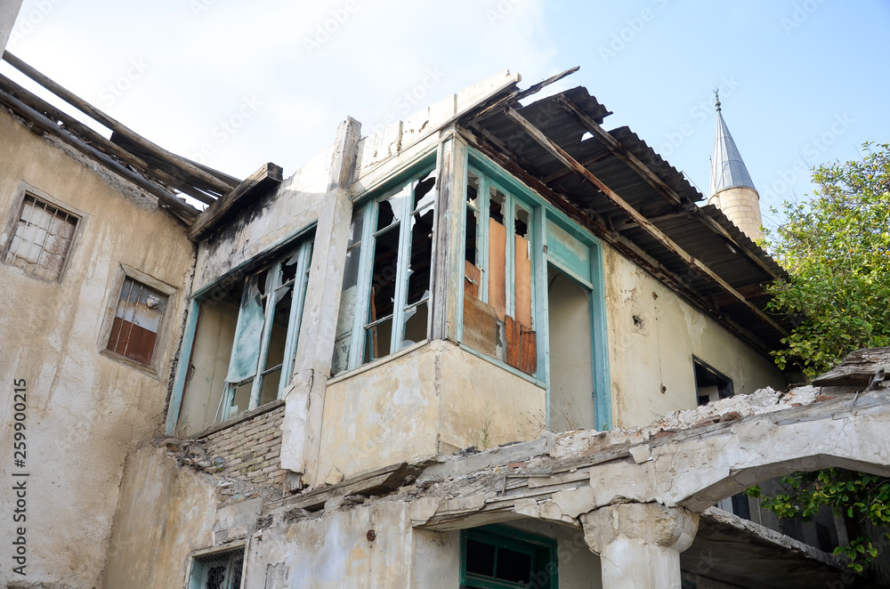 Destroyed house with broken windows on Turkish side of Nicosia, Cyprus Destroyed house with broken windows on Turkish side of Nicosia, Cyprus