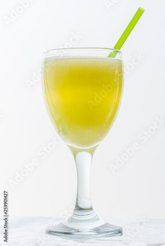 pineapple water in glass on white background
