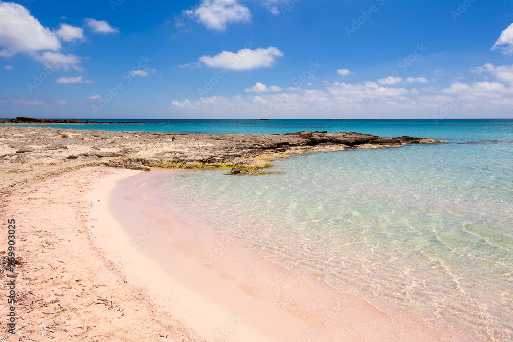 Elafonisi beach with pink sand, warm and crystal clear water. Crete Island, Greece