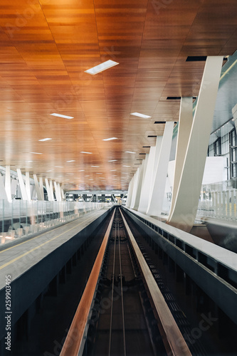 Fototapeta Naklejka Na Ścianę i Meble -  Ways of terminal shuttle train in Hamad international airport in Qatar