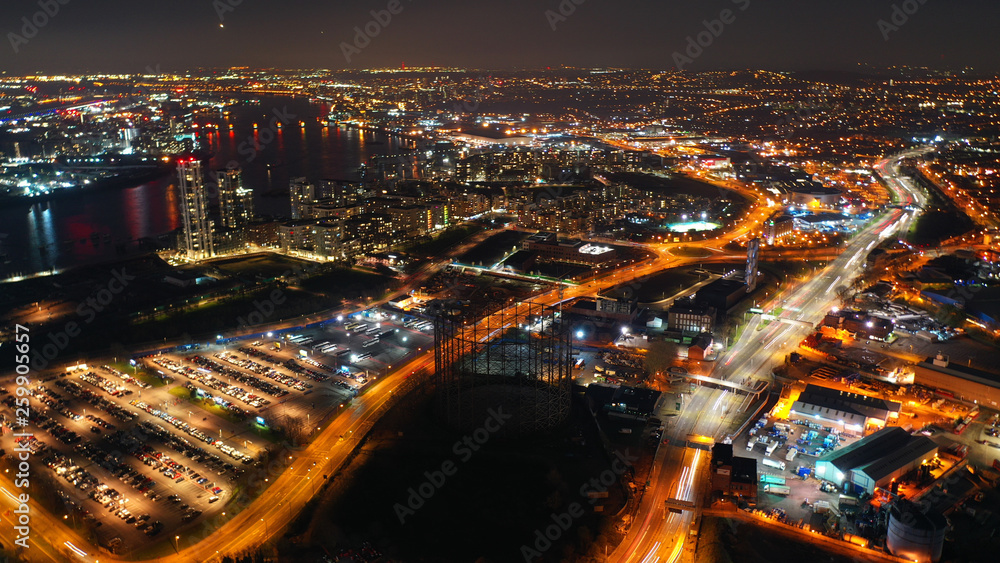 Fototapeta premium Aerial drone night shot from iconic Greenwich Peninsula in the heart of London, United Kingdom