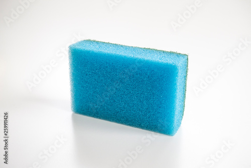 Isolated blue sponge on the white background