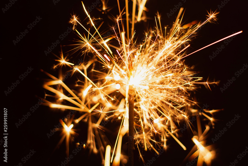 Sparkler background. Christmas and new year sparkler holiday background. Sparkler background. Christmas and new year sparkler holiday background.