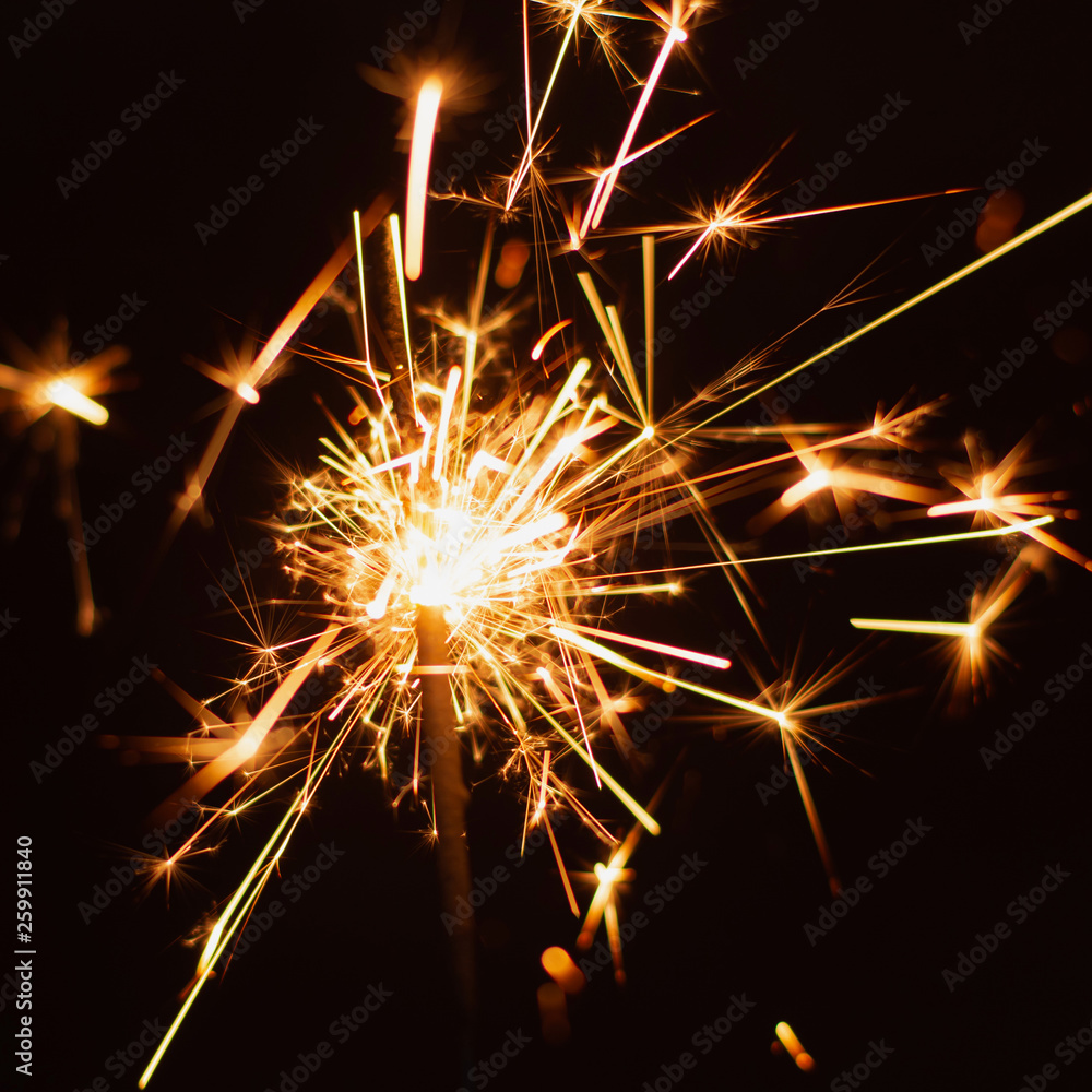 Sparkler background. Christmas and new year sparkler holiday background.