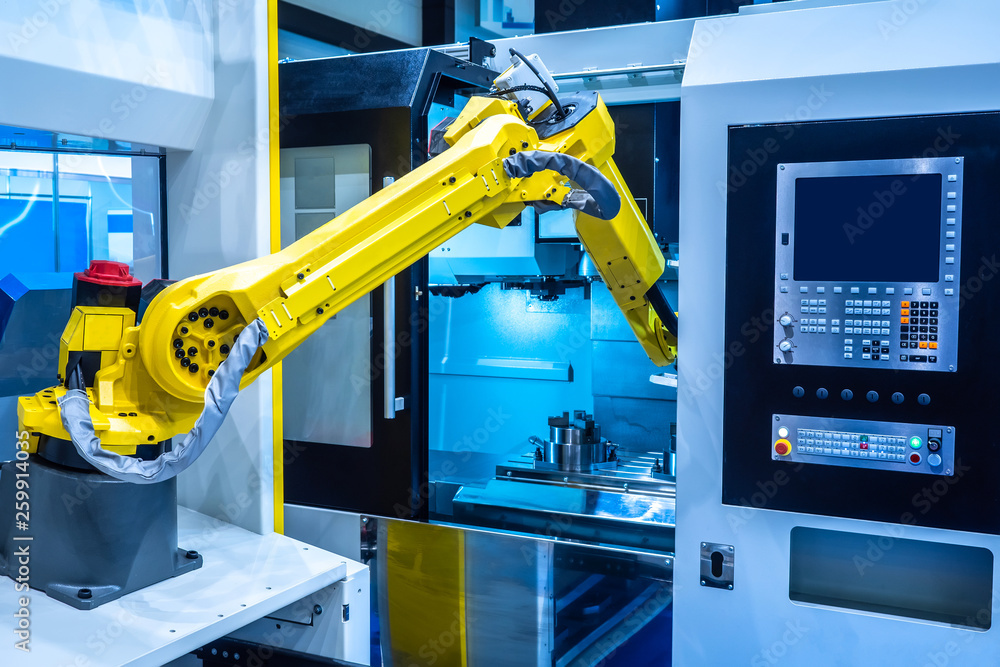 Robot hand. Industrial manipulator. The robot performs turning work