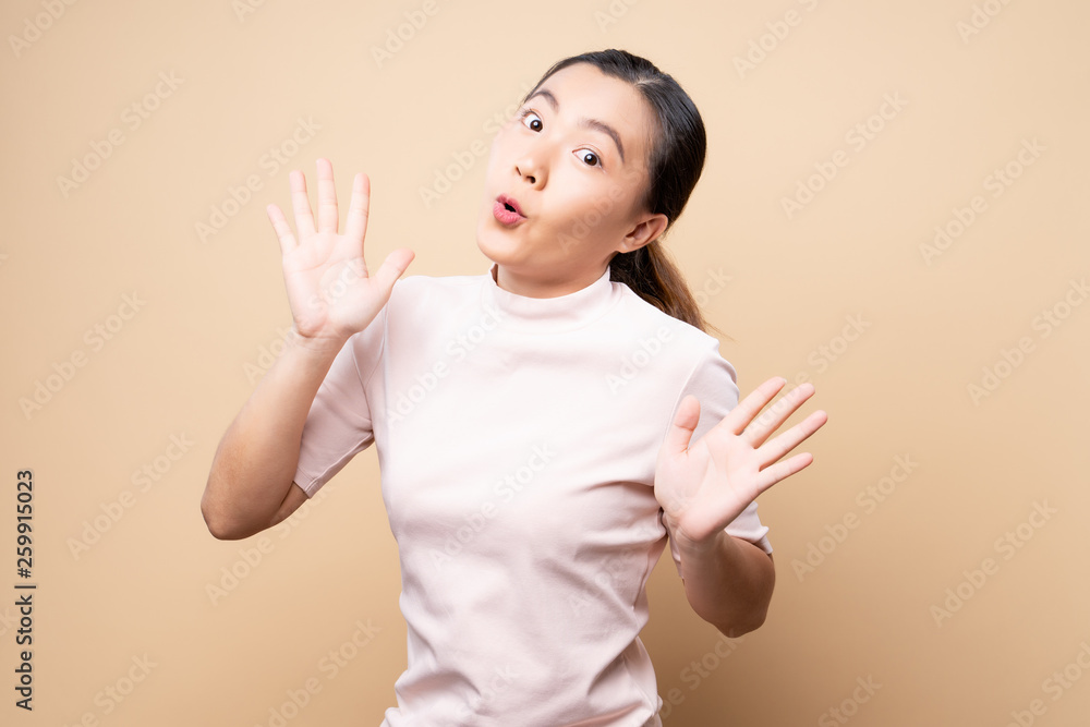 Portrait of excited woman isolated over background Portrait of excited woman isolated over background