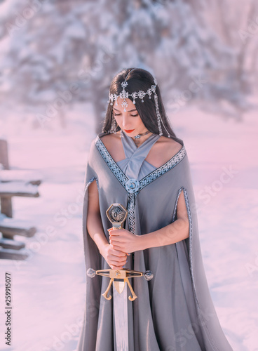 Dekoracja na wymiar  charming-sweet-dark-haired-girl-with-closed-eyes-reads-prayer-to-gods-of-war-before-terrible-fight-elegant-princess-holds-silver-sword-meditation-with-weapon-for-hardening-spirit-of-warrior