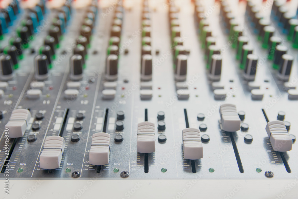 Audio sound mixer control panel.  Sound console buttons for adjust the volume