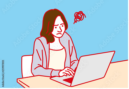 ノートパソコンで仕事をする女性  困る