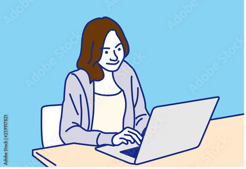 ノートパソコンで仕事をする女性