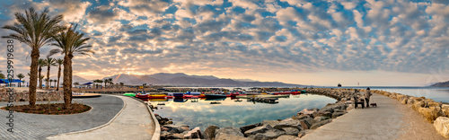 Morning  on central promenade and walking pier in Eilat - a famous tourist  I...