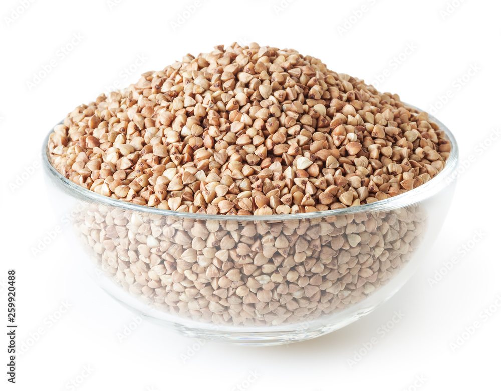Roasted buckwheat grains in glass bowl isolated on white background with clipping path Roasted buckwheat grains in glass bowl isolated on white background with clipping path