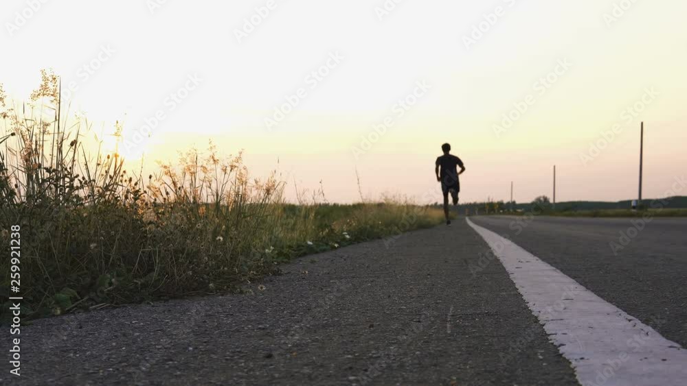 Young man runner at running for healthy.Running is an exercise as simple in order to make health of strong, Good health can not be traded. Young man runner at running for healthy.Running is an exercise as simple in order to make health of strong, Good health can not be traded.