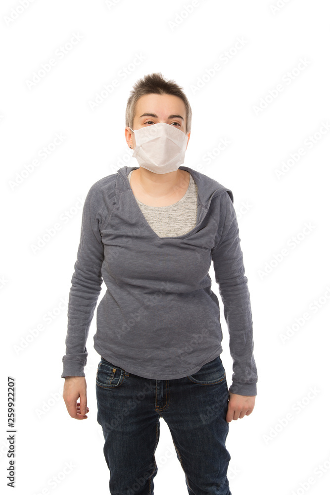 white attractive brunette woman with short hair wearing a mask during a flu epidemic. Isolated on white background white attractive brunette woman with short hair wearing a mask during a flu epidemic. Isolated on white background