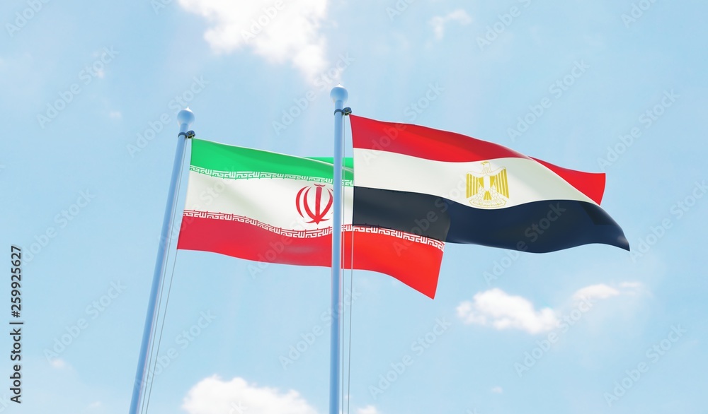 Egypt and Iran, two flags waving against blue sky. 3d image