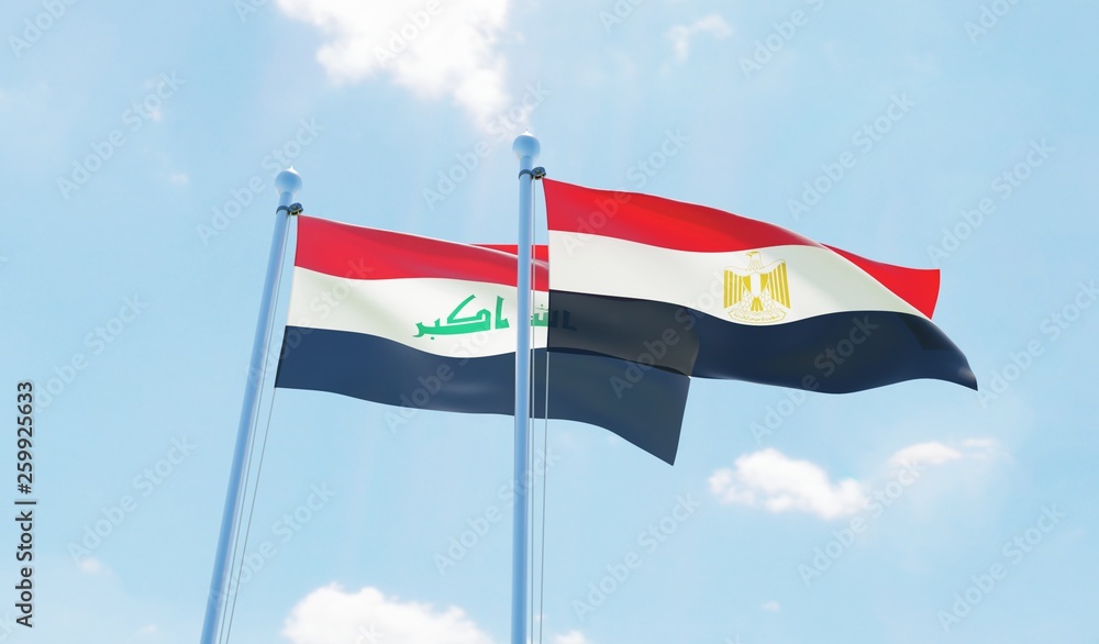 Egypt and Iraq, two flags waving against blue sky. 3d image Egypt and Iraq, two flags waving against blue sky. 3d image
