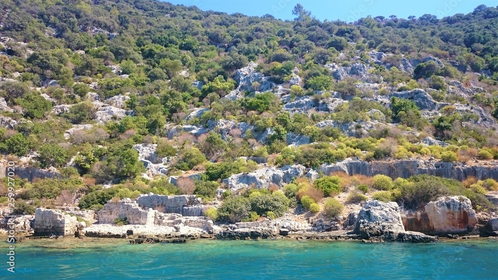The sunken ruins on the island of Kekova Dolichiste of the ancient Lycian city of ancient Simena, was destroyed by an earthquake, rebuilt and existed until the Byzantine era. Antalya, Turkey.