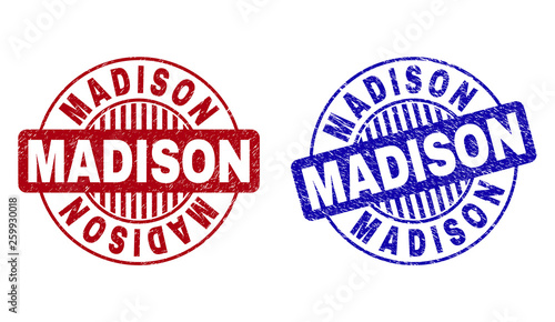 Grunge MADISON round stamp seals isolated on a white background. Round seals with grunge texture in red and blue colors. Vector rubber overlay of MADISON label inside circle form with stripes.