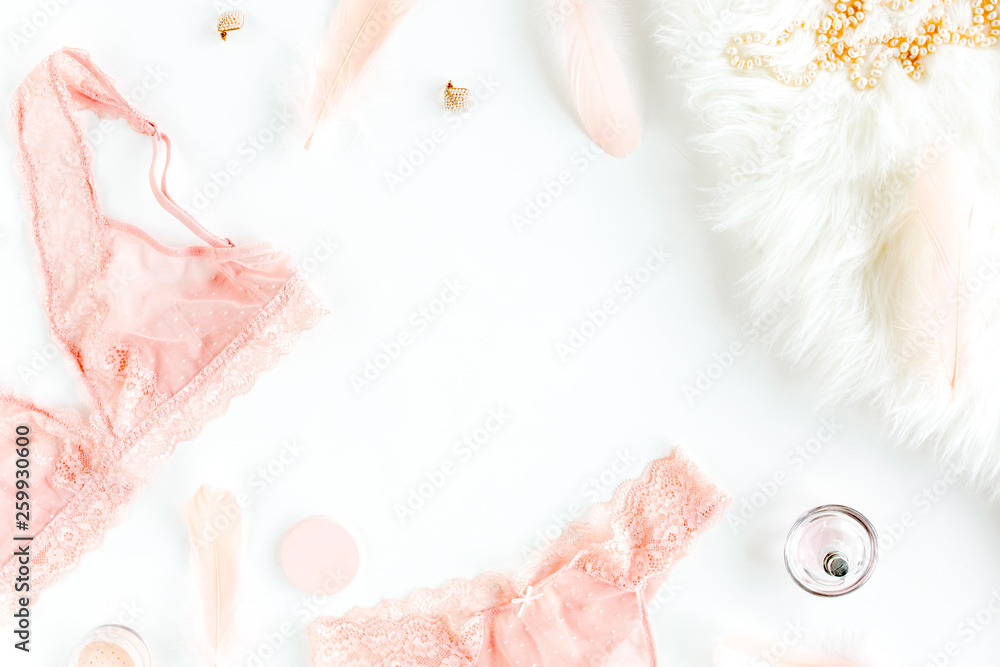 Flat lay set of sexy, lacy, pink lingerie, accessories on white background. Top view. Flat lay set of sexy, lacy, pink lingerie, accessories on white background. Top view.