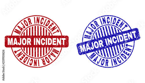 Grunge MAJOR INCIDENT round stamp seals isolated on a white background. Round seals with grunge texture in red and blue colors.