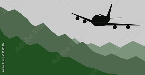 Airplane Flying over Mountains