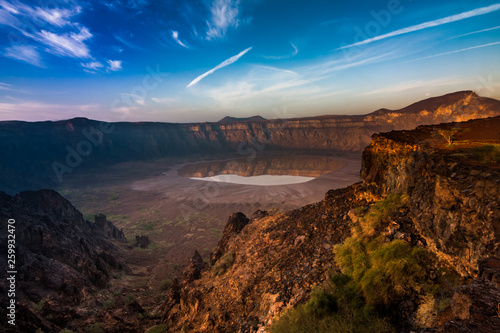 фотографія A stunning view of the Al Wahbah crater on a sunny day, Saudi Arabia