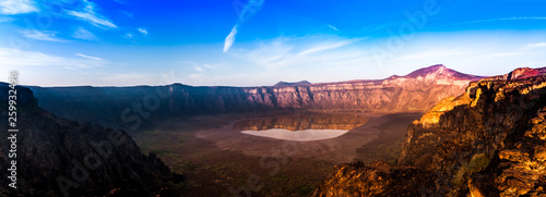 Fotografia, Obraz A stunning view of the Al Wahbah crater on a sunny day, Saudi Arabia