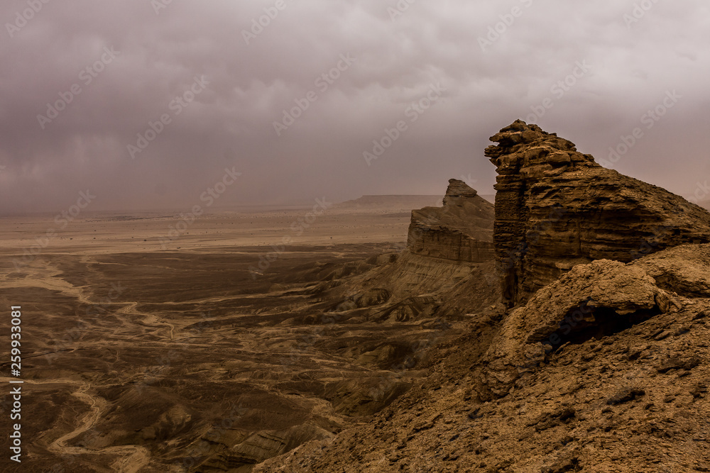 Desert landscape with thunderclouds and sandstorm in Lower Najd, Saudi Arabia
