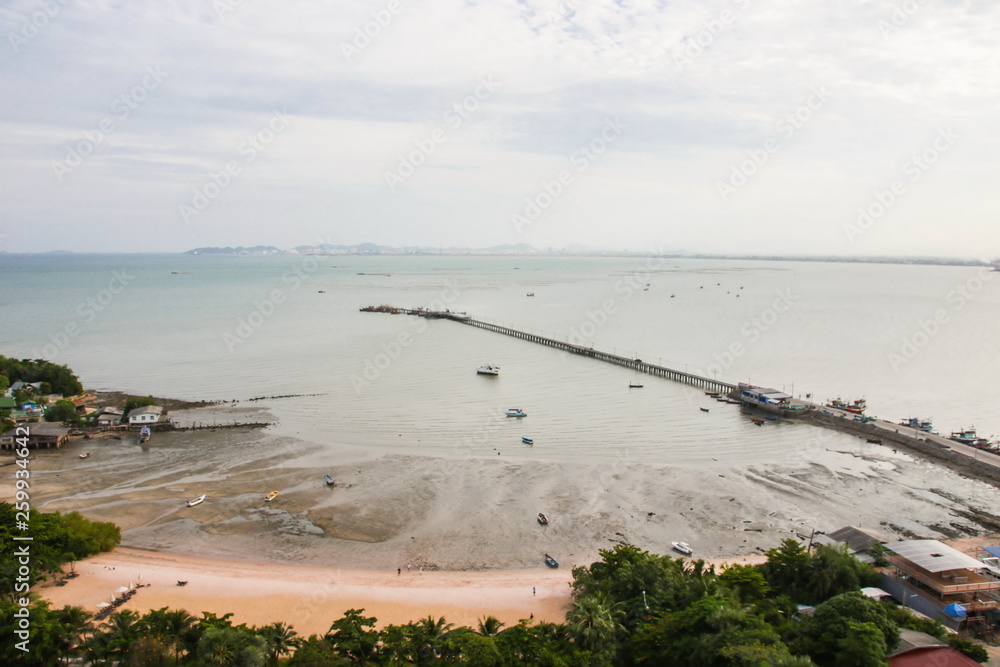 Low tide sea in the morning at Chonburi, Thailand.